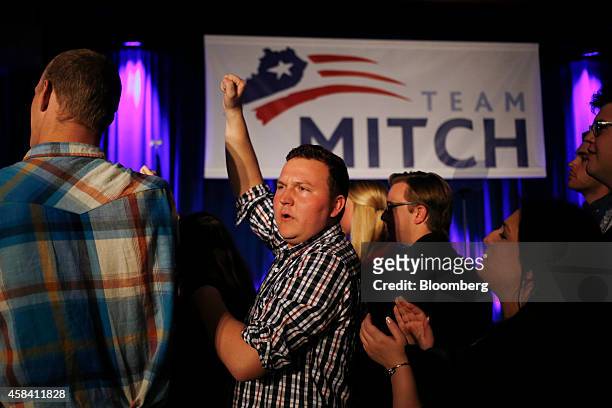 Supporters of Senate Minority Leader Mitch McConnell react as the race is called in McConnell's favor at a Republican Party of Kentucky election...