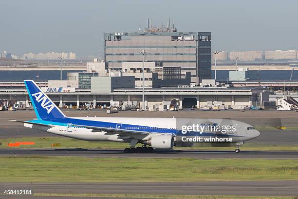 all nippon airways boeing 777-200er - tokyo international airport stock pictures, royalty-free photos & images