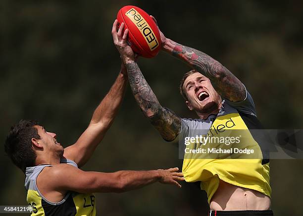 Saints newest recruit Tim Membrey marks the ball against Darren Michington during a St.Kilda Saints AFL media session at Linen House Oval on November...