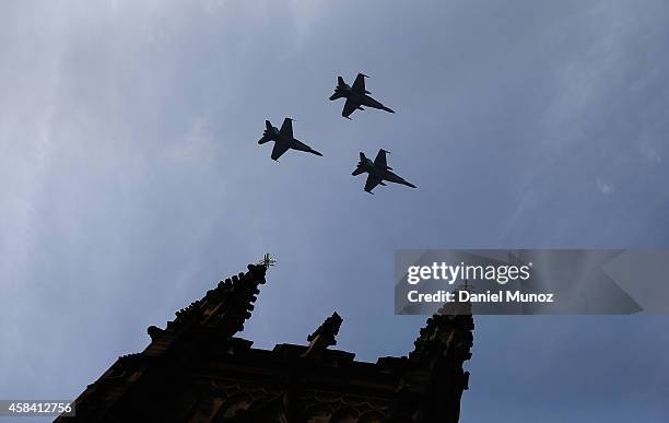 Hornets fly over St Andrew's Cathedral during the memorial service of former Australian Prime Minister Gough Whitlam at Sydney Town Hall on November...