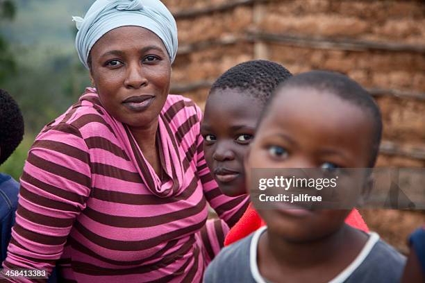 zulu woman and children in rural south africa - zulu women stock pictures, royalty-free photos & images