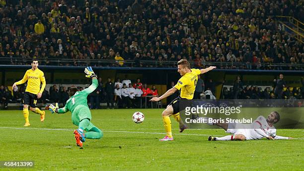 Ciro Immobile of Dortmund scores his team's third goal during the UEFA Champions League Group D match between Borussia Dortmund and Galatasaray AS at...