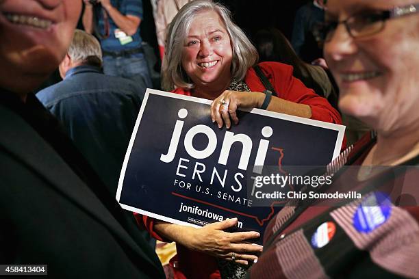 Supporters of Republican U.S. Senate candidate Joni Ernst gather for an election night party at the Marriott Hotel November 4, 2014 in West Des...