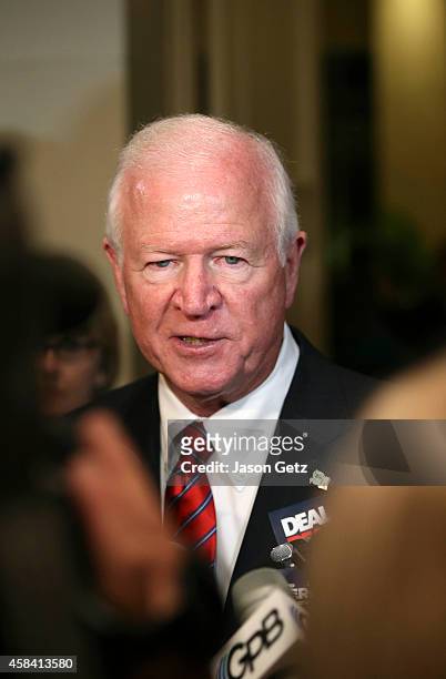 Sen. Saxby Chambliss, R-Ga., speaks to members of the media during a gathering for Republican U.S. Senate candidate David Perdue at the...