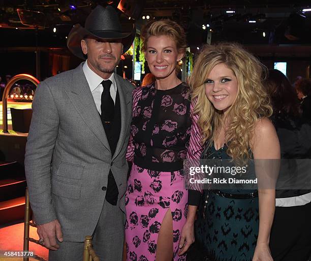 Singers Tim McGraw, Faith Hill, and Natalie Stovall attend the BMI 2014 Country Awards at BMI on November 4, 2014 in Nashville, Tennessee.