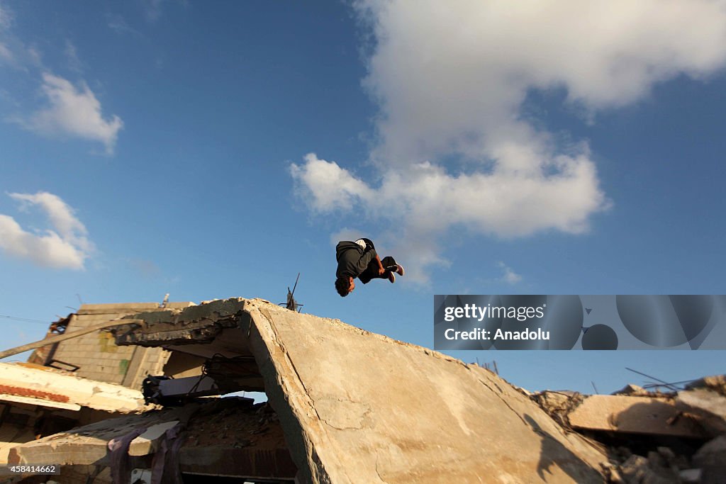 Palestinian youth practice their parkour skills