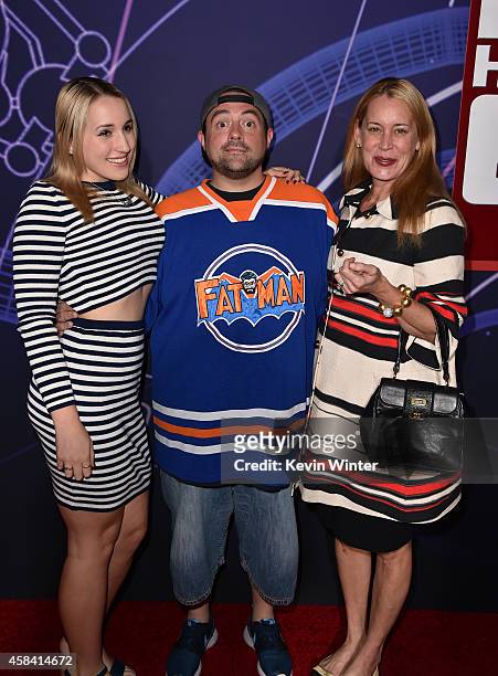 Harley Quinn Smith, director Kevin Smith and actress Jennifer Schwalbach Smith attend the premiere of Disney's "Big Hero 6" at the El Capitan Theatre...