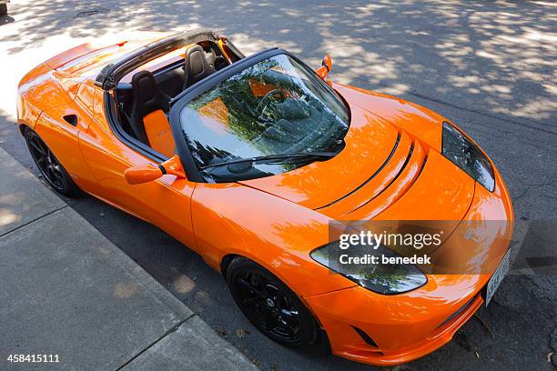 tesla roadster electric sports car - sports roadster stock pictures, royalty-free photos & images