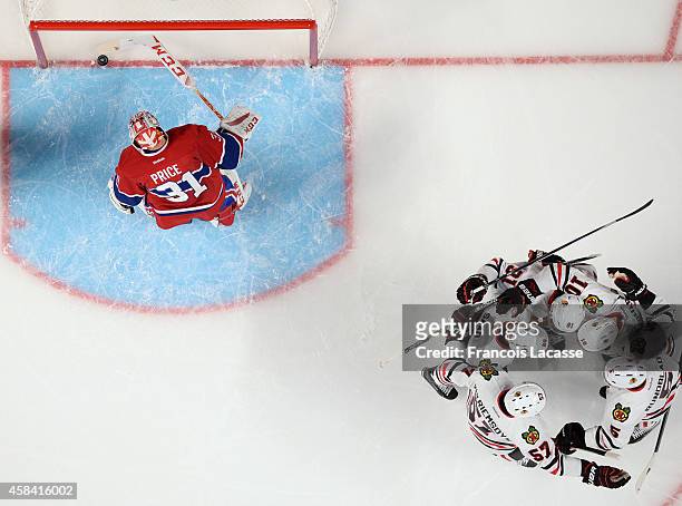 The Chicago Blackhawks celebrate after a goal scored on the third period of the game against the Montreal Canadiens in the NHL at the Bell Centre on...