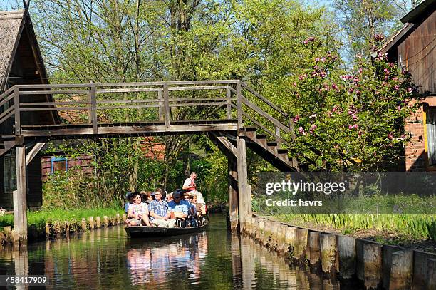 boat with tourist on channel at spreewald (germany) - ecological reserve stock pictures, royalty-free photos & images