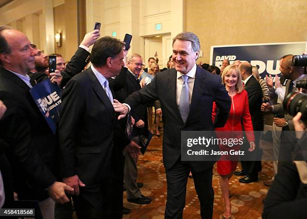 Republican U.S. Senate candidate David Perdue and his wife Bonnie enter his election party to celebrate his win at the InterContinental Buckhead...