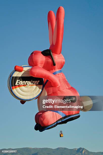 energizer bunny hot air balloon at sunrise - energizer bunny stock pictures, royalty-free photos & images