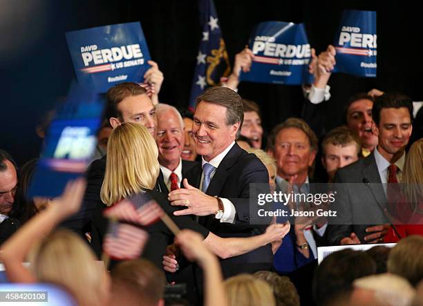 Republican U.S. Senate candidate David Perdue celebrates his win at the InterContinental Buckhead November 4, 2014 in Atlanta, Georgia. Perdue...