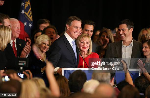 Republican U.S. Senate candidate David Perdue celebrates his win with his wife Bonnie at the InterContinental Buckhead November 4, 2014 in Atlanta,...