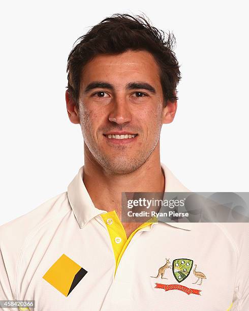 Mitchell Starc of Australia poses during the Australia Test team headshots session at the Intercontinental Hotel on August 11, 2014 in Sydney,...
