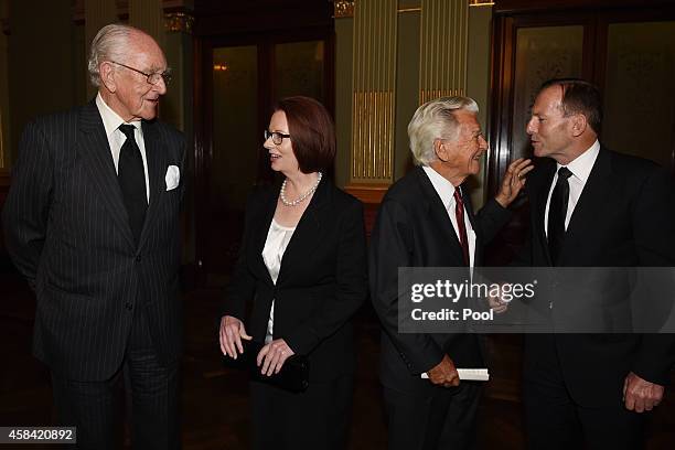 Former Prime Ministers Malcolm Fraser, Julia Gillard, Bob Hawke and current Prime Minister Tony Abbott mingle following the state memorial service...