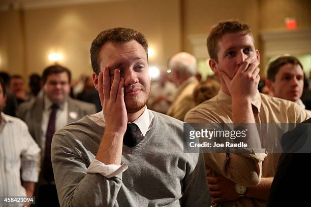 Daniel Whitely and Evan Seekins attend the election night party for former Florida Governor and Democratic gubernatorial candidate Charlie Crist as a...