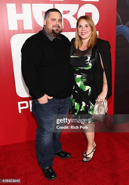 Storyboard Supervisor at Disney Studios Paul Briggs and guest attend the Los Angeles Premiere of Walt Disney Animation Studios Big Hero 6" at El...
