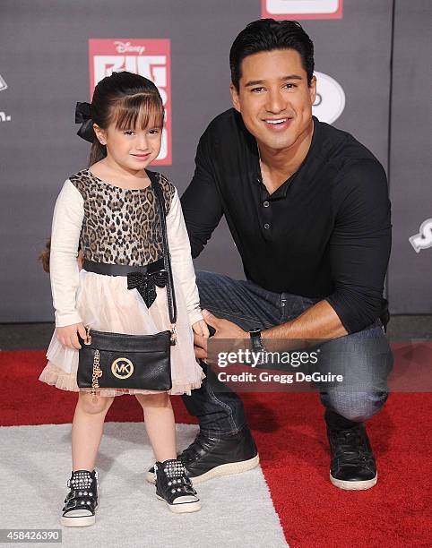 Actor Mario Lopez and daughter Gia Francesca Lopez arrive at the Los Angeles premiere of Disney's "Big Hero 6" at the El Capitan Theatre on November...