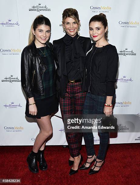 Actress Lori Loughlin and her daughters Isabella Giannulli and Olivia Giannulli arrive at the Hallmark Channel's Holiday Christmas world premiere...
