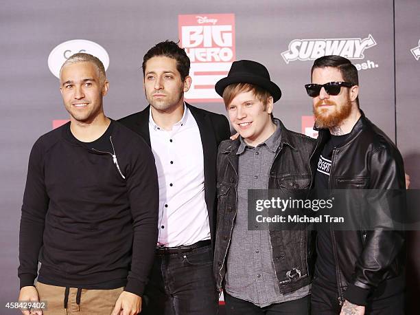 Joe Trohman, Pete Wentz, Patrick Stump and Andy Hurley of Fall Out Boy arrive at the Los Angeles premiere of "Big Hero 6" held at the El Capitan...