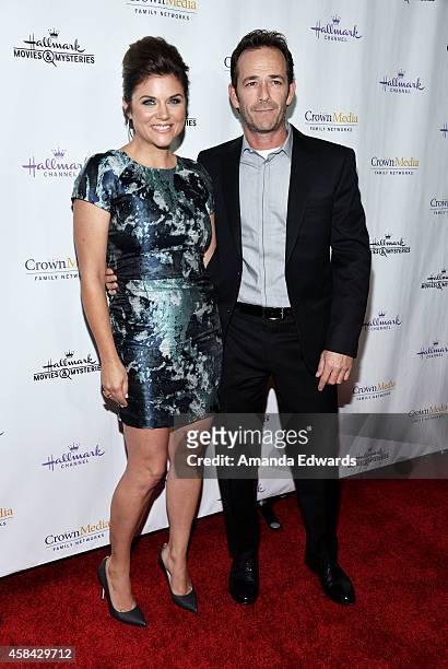 Actress Tiffani Thiessen and actor Luke Perry arrive at the Hallmark Channel's Holiday Christmas world premiere screening of "Northpole" at La Piazza...