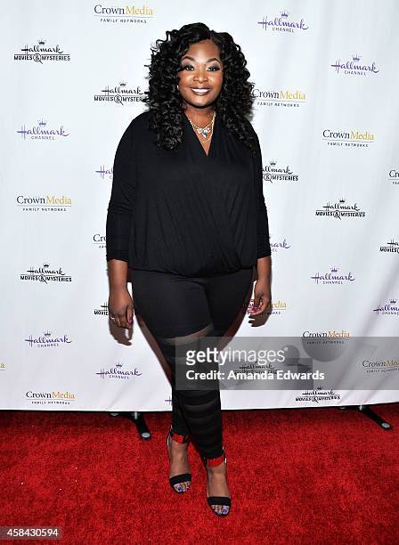 Actress and singer Candice Glover arrives at the Hallmark Channel's Holiday Christmas world premiere screening of "Northpole" at La Piazza Restaurant...