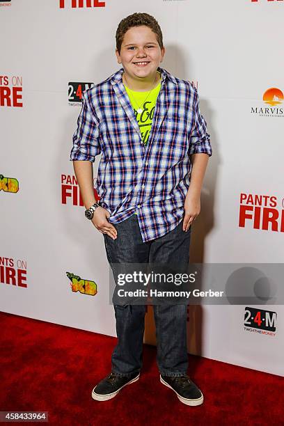 Cade Sutton arrives to the Disney XD "Pants On Fire" premiere on November 4, 2014 in Hollywood, California.