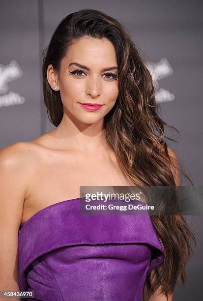 Actress Genesis Rodriguez arrives at the Los Angeles premiere of Disney's "Big Hero 6" at the El Capitan Theatre on November 4, 2014 in Hollywood,...