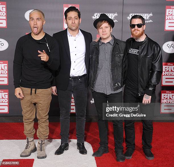 Musicians Pete Wentz, Joe Trohman, Patrick Stump and Andy Hurley of Fall Out Boy arrive at the Los Angeles premiere of Disney's "Big Hero 6" at the...