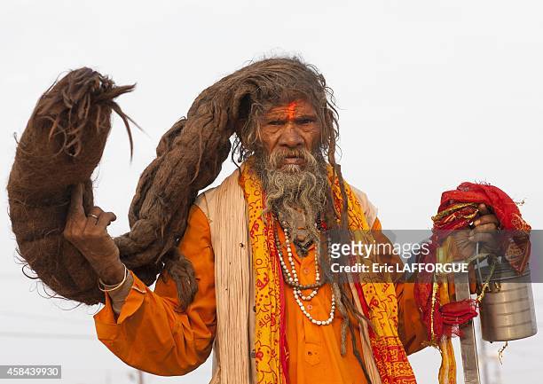 Naga sadhu with very long hair, maha kumbh mela, on February 12, 2013 in Allahabad, India.