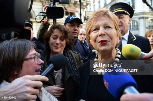 French writer Lydie Salvayre cries as she arrives at the Drouant restaurant in Paris, after being awarded with France's top literary prize, the...