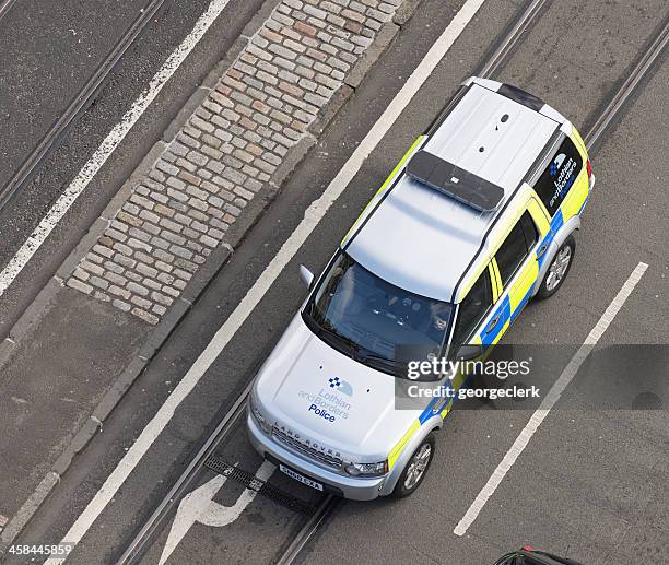 british police vehicle from above - police land rovers stock pictures, royalty-free photos & images