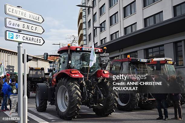 French farmers enter in the French southern city of Marseille with tractors, on November 5 at the start of a demonstration to protest especially...