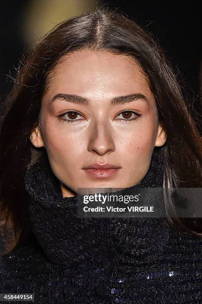 Model walks the runway at the Tufi Duek fashion show during Sao Paulo Fashion Week Winter 2015 at Parque Candido Portinari on November 3, 2014 in Sao...