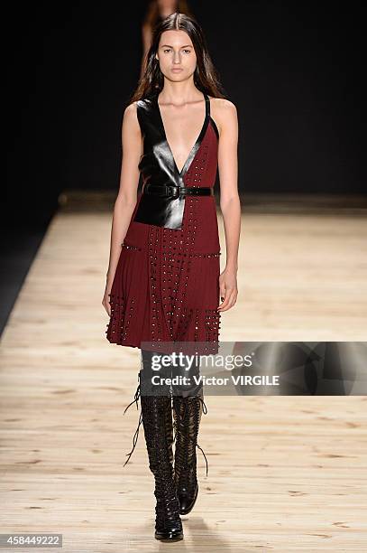 Model walks the runway at the Tufi Duek fashion show during Sao Paulo Fashion Week Winter 2015 at Parque Candido Portinari on November 3, 2014 in Sao...