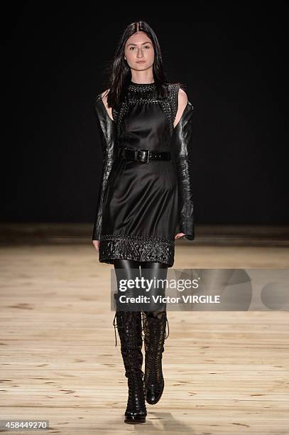 Model walks the runway at the Tufi Duek fashion show during Sao Paulo Fashion Week Winter 2015 at Parque Candido Portinari on November 3, 2014 in Sao...