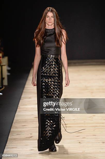 Model walks the runway at the Tufi Duek fashion show during Sao Paulo Fashion Week Winter 2015 at Parque Candido Portinari on November 3, 2014 in Sao...