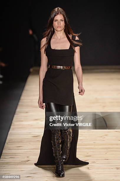 Model walks the runway at the Tufi Duek fashion show during Sao Paulo Fashion Week Winter 2015 at Parque Candido Portinari on November 3, 2014 in Sao...