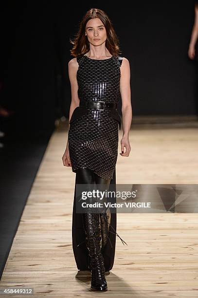 Model walks the runway at the Tufi Duek fashion show during Sao Paulo Fashion Week Winter 2015 at Parque Candido Portinari on November 3, 2014 in Sao...