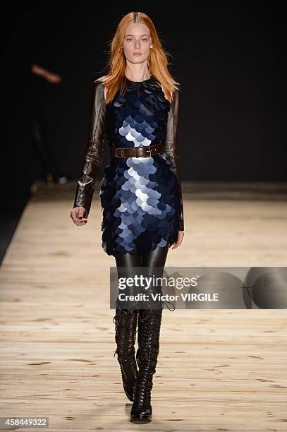 Model walks the runway at the Tufi Duek fashion show during Sao Paulo Fashion Week Winter 2015 at Parque Candido Portinari on November 3, 2014 in Sao...