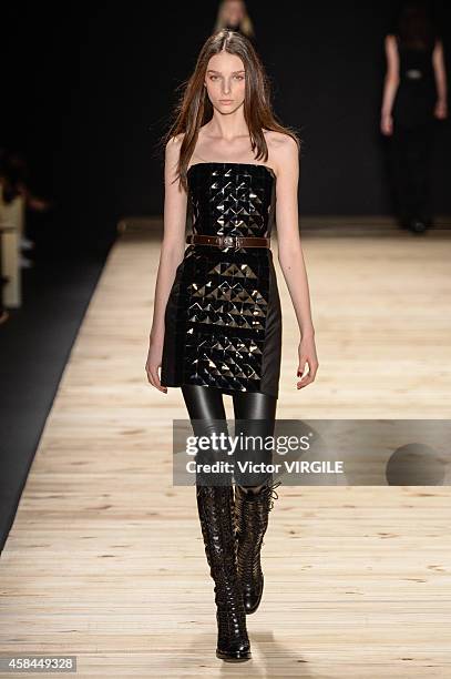 Model walks the runway at the Tufi Duek fashion show during Sao Paulo Fashion Week Winter 2015 at Parque Candido Portinari on November 3, 2014 in Sao...