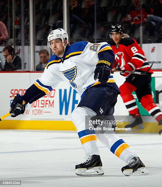 Patrik Berglund of the St. Louis Blues skates against the New Jersey Devils at the Prudential Center on November 4, 2014 in Newark, New Jersey. The...