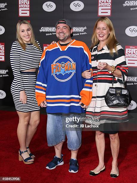 Harley Quinn Smith; Kevin Smith; actress Jennifer Schwalbach attend the Disney's "Big Hero 6" Los Angeles Premiere held at the El Capitain Theater on...