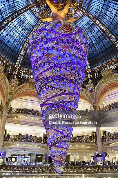 General view of atmosphere is seen during the Christmas decorations inauguration at Galeries Lafayette on November 5, 2014 in Paris, France.