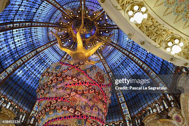 General view of atmosphere is seen during the Christmas decorations inauguration at Galeries Lafayette on November 5, 2014 in Paris, France.