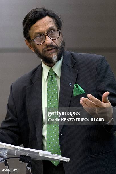 The head of the UN's climate science panel Rajendra Pachauri speaks during a climate conference in Paris on November 5, 2014. AFP PHOTO / KENZO...