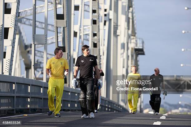 Damien Fleming, Stephen Fleming, Andy Bichel and Chris Harris about to play cricket on Auckland Harbour Bridge, marking 100 days to go until the ICC...