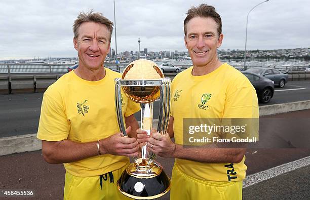 Damien Fleming and Andy Bichel on Auckland Harbour Bridge, marking 100 days to go until the ICC Cricket World Cup 2015 which takes place in New...