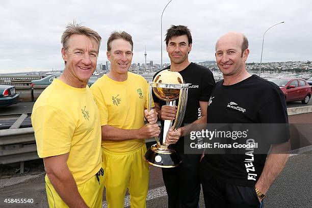 Damien Fleming Stephen Fleming Andy Bichel and Chris Harris on Auckland Harbour Bridge, marking 100 days to go until the ICC Cricket World Cup 2015...